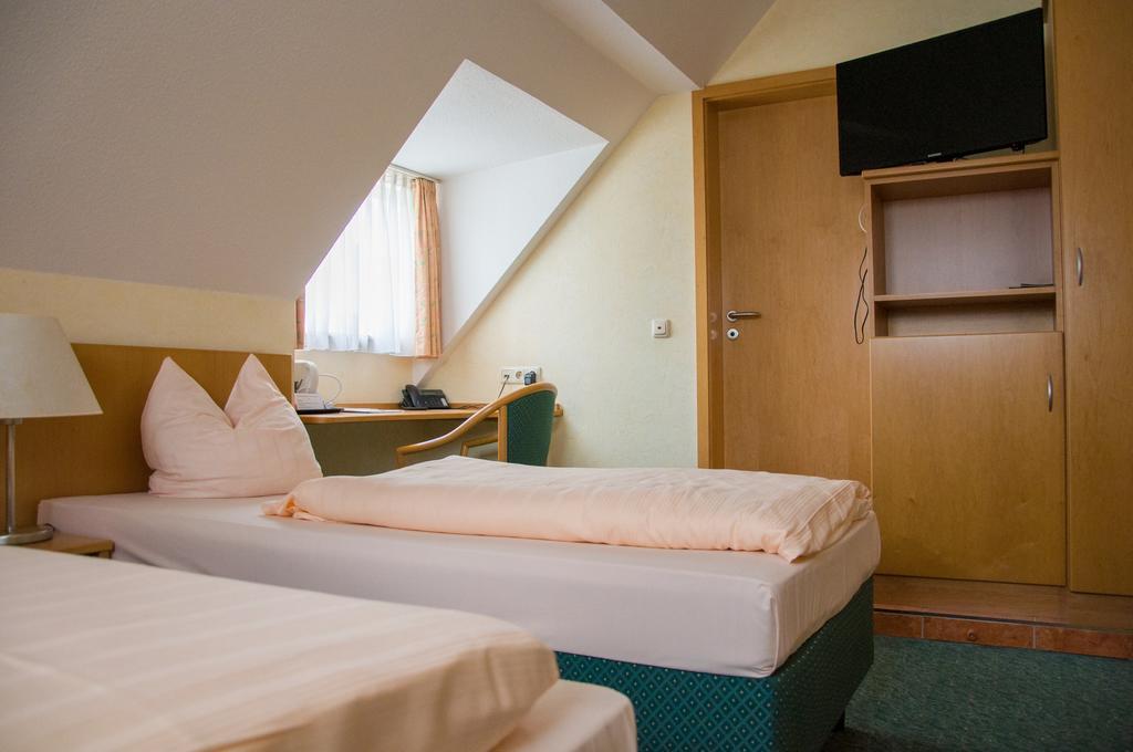 Hotel Domizil Alte Post Püttlingen Pokoj fotografie